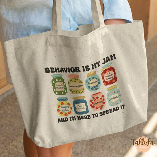A canvas tote bag, with cute jam jars design, written "Behavior is my jam", featuring descriptive words related to behavior analyst, ABA theray, Beahavioral therapist